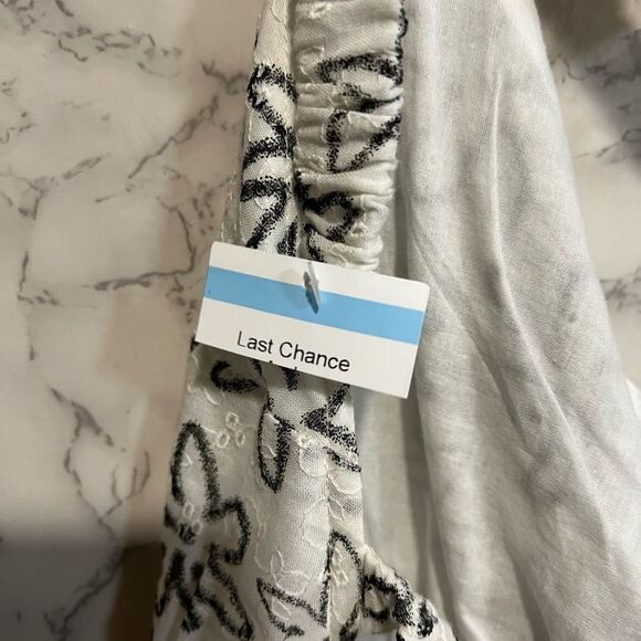 ASOS DESIGN printed eyelet open back skater mini sundress in mono daisy print 14 - Picture 7 of 12